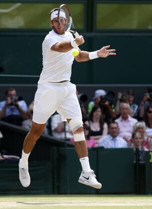 (130705) -- LONDON, July 5, 2013 (Xinhua) -- Juan Martin Del Potro of Argentina competes during the semifinal of gentlemen s singles on day 11 of the Wimbledon Lawn Tennis Championships at the All England Lawn Tennis and Croquet Club in London, Britain on July 5, 2013. (Xinhua Wang Lili) (SP)BRITAIN-LONDON-TENNIS-WIMBLEDON-DAY 11 