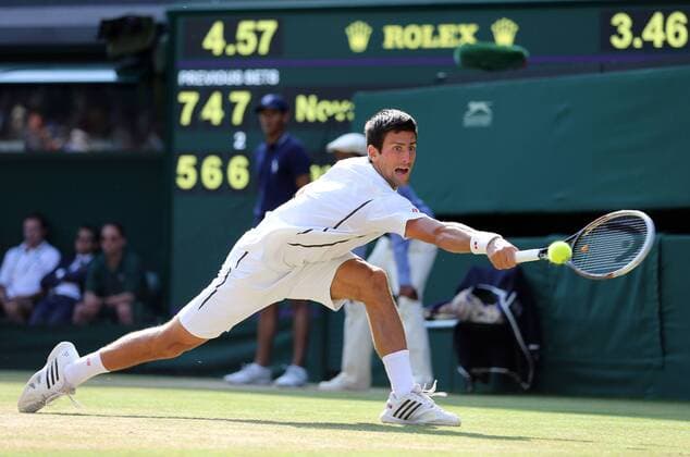 Novak Djokovic during in the semifinal at the Wimbledon Tennis Championships in London, Friday, 5th July 2013 Picture by StephenxLock i-Images StephenxLockx xi-Images  IIM-0185-0067