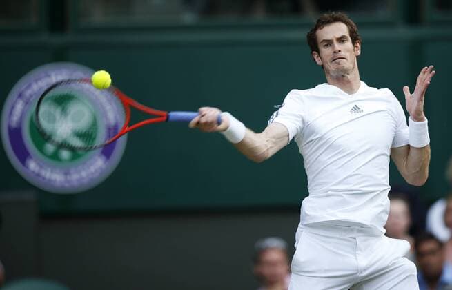 Andy Murray of Britain competes during the semifinal of men s singles on day 11 of the Wimbledon Lawn Tennis Championships at the All England Lawn Tennis and Croquet Club in London, Britain on July 5, 2013. (Xinhua Wang Lili) (SP)BRITAIN-LONDON-TENNIS-WIMBLEDON-DAY 11 