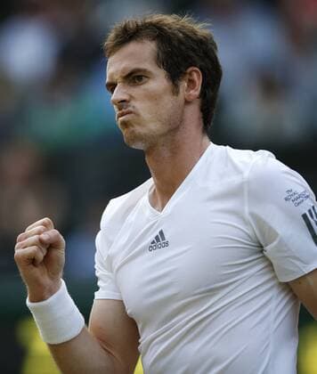 Andy Murray of Britain celebrates during the semifinal of men s singles on day 11 of the Wimbledon Lawn Tennis Championships at the All England Lawn Tennis and Croquet Club in London, Britain on July 5, 2013. (Xinhua Wang Lili) (SP)BRITAIN-LONDON-TENNIS-WIMBLEDON-DAY 11 