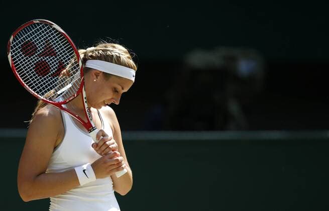 (130706) -- LONDON, July 6, 2013 (Xinhua) -- Sabine Lisicki of Germany reacts during her final of women s singles on day 12 of the Wimbledon Lawn Tennis Championships at the All England Lawn Tennis and Croquet Club in London, Britain, on July 6, 2013. 