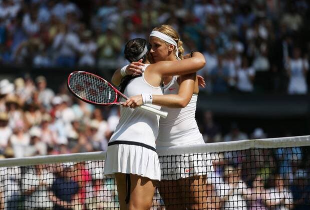 Marion Bartoli celebrates victory over Sabine Lisicki in the Women s Final of the 2013 Wimbledon Championships in London on July 6, 2013.  LON2013070606