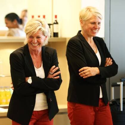 FRANKFURT AM MAIN, GERMANY - JULY 07: Head coach Silvia Neid (L) and Manager Doris Fitschen (R) attend the Germany women s national team departure to Sweden at Frankfurt Airport on July 7, 2013 in Frankfurt am Main, Germany. Local Caption Doris Fitschen; Silvia Neid