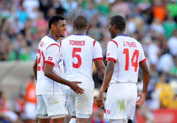 07 July 2013: Midfielder Anibal Godoy (20) of Panama, Defender Roman Torres (5) of Panama, and Midfielder Juan De Dios Perez (14) of Panama celebrate the victory during the CONCACAF Gold Cup soccer match between Mexico v Panama at the Rose Bowl in Pasadena, CA. SOCCER: JUL 07 CONCACAF Gold Cup - Mexico v Panama Icon0071307072439 EDITORIAL USE ONLY
