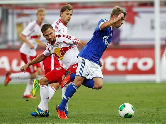 FUSSBALL - RBS vs Schalke, Testspiel SALZBURG,AUSTRIA,11.JUL.13 - FUSSBALL - tipp3 Bundesliga powered by T-Mobile, DFL, 1. Deutsche Bundesliga, Red Bull Salzburg vs FC Schalke 04, Vorbereitungsspiel. Bild zeigt Max Meyer (Schalke) und Andreas Ulmer (RBS). 