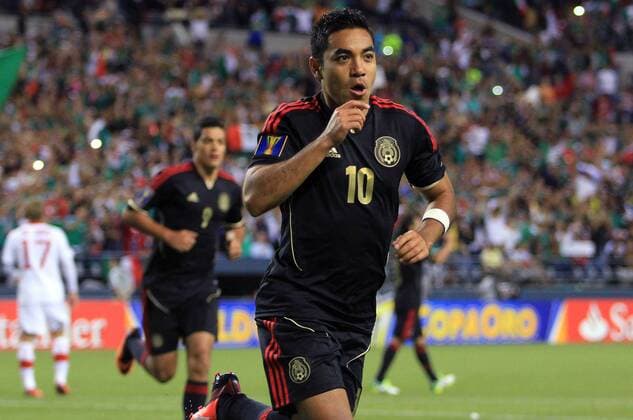 SEATTLE, July 11, 2013 - Mexico s Marco Fabian (front) celebrates after scoring during the Gold Cup 2013 match between Mexico and Canada in Seattle, the United States, on July 11, 2013. (Xinhua Alfredo Lopez Jam Media) (itm) (sp) (SP)US-SEATTLE-SOCCER-GOLD CUP-MEXICO VS CANADA 