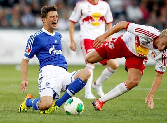 FUSSBALL - RBS vs Schalke, Testspiel SALZBURG,AUSTRIA,11.JUL.13 - FUSSBALL - tipp3 Bundesliga powered by T-Mobile, DFL, 1. Deutsche Bundesliga, Red Bull Salzburg vs FC Schalke 04, Vorbereitungsspiel. Bild zeigt Leon Goretzka (Schalke) und Havard Nielsen (RBS). 