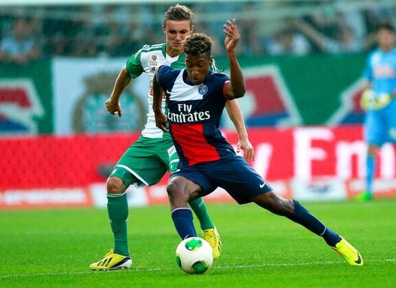 FUSSBALL - Rapid vs PSG, Testspiel WIEN,AUSTRIA,12.JUL.13 - FUSSBALL - tipp3 Bundesliga powered by T-Mobile, Ligue 1, SK Rapid Wien vs Paris Saint-Germain FC, IFCS Trainingslager, Vorbereitungsspiel. Bild zeigt Mario Pavelic (Rapid) und Kingsley Coman (PSG). Keywords: Wien Energie. 