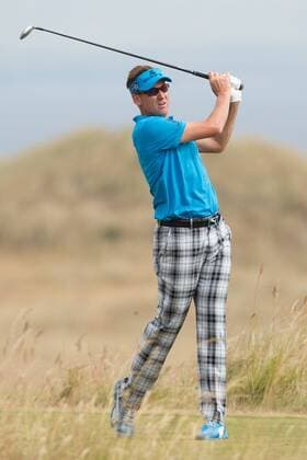 Golf - 2013 Open Championship at Muirfield - Thursday Round One Ian Poulter of England tees off on the 6th 