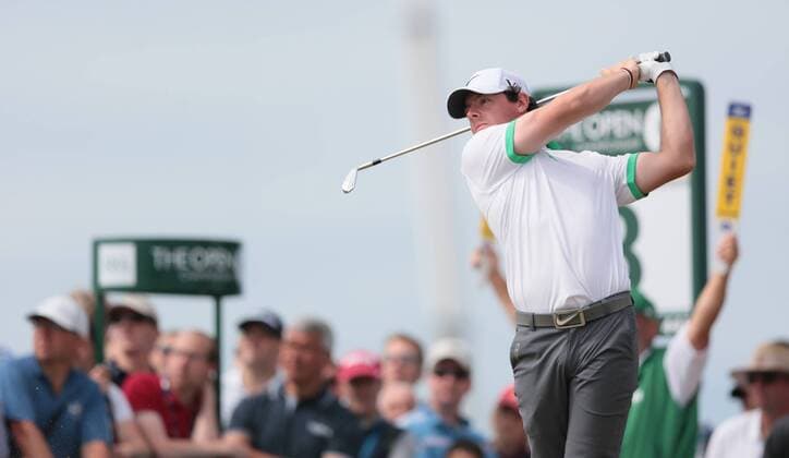 Northern Ireland s Rory Mcilroy drives on the 8th tee on the first day of the 2013 Open Championship in Muirfield, Scotland on July 18 , 2013.  LON2013071818