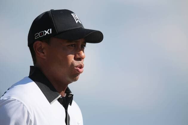 USA s Tiger Woods on the 9th fairway on the first day of the 2013 Open Championship in Muirfield, Scotland on July 18 , 2013.  LON2013071835