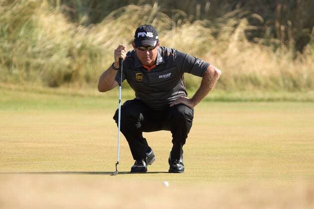 Golf - 2013 Open Championship at Muirfield - Friday Round Two Lee Westwood of England lines up a putt on the 2nd green 