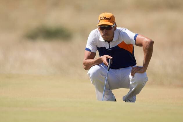 Golf - 2013 Open Championship at Muirfield - Friday Round Two Rafael Cabrera-Bello of Spain lines up a putt on the 5th 