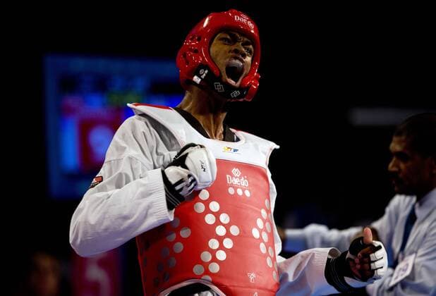 Robelis Despaigne of Cuba, reacts in the 87kg male quarterfinals of the Taekwondo World Championship of the World Taekwondo Federation (WTF), at the Expositions and Coventions Center of Puebla, in Puebla, Mexico, on July 19, 2013. (Xinhua Guillermo Arias) (rt) (SP)MEXICO-PUEBLA-TAEKWONDO-WORLD CHAMPIONSHIP 
