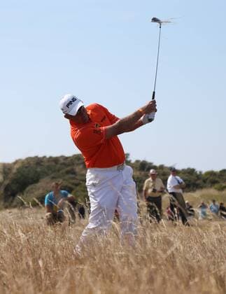 England s Lee Westwood hits out of the rough on the second hole on the third day of the 2013 Open Championship in Muirfield, Scotland on July 20 , 2013.  LON2013072023
