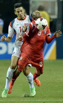July 20, 2013 - Atlanta, Georgia, U.S. - Panama midfielder MARCOS SANCHEZ (8) is fouled by Cuba defender JORGE LUIS CORRALES (13) in the first half of a Gold Cup quarterfinal at the Georgia Dome in Atlanta on Saturday. Panama defeated Cuba, 6-1. Soccer 2013 - CONCACAF Gold Cup - Panama Beats Cuba 6-1 - ZUMAm67