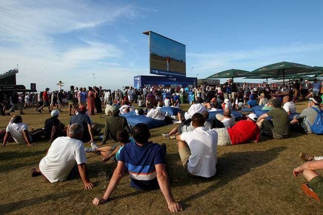 20.07.13 Muirfield, East Lothian, Scotland. The crowd watch the big screen in the tented village during the third round of The Open Golf Championship from Muirfield. The 2013 Open Championship will be the 142nd Open Championship held 18-21 July at Muirfield Golf Links in Gullane, East Lothian, Scotland. xIanxBinesx  ActionPlus11430742