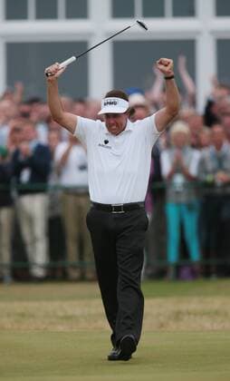 USA s Phil Mickelson celebrates a birdie on the eighteenth green leading to his win of the Open Championship at Muirfield on the fourth day of the 2013 Open Championship in Muirfield, Scotland on July 21 , 2013. Mickelson won with a score of three under par.  LON2013072116