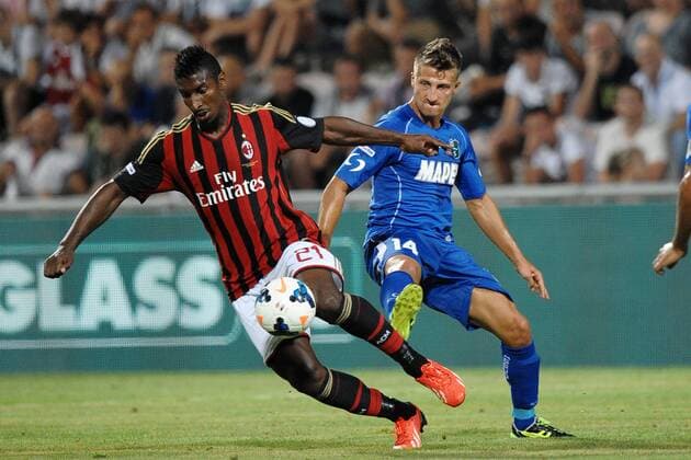 Kevin Constant (Milan) Gaetano Masucci (Sassuolo) AC Milan - Sassuolo Clacio. Trofeo Tim Triangolare di calcio Milan - Sassuolo 23 07 2013 Reggio Emilia, stadio Mapei - Citta del Tricolore. Football 2013 AntoniettaxBaldassarre