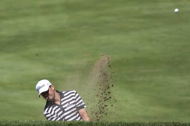 July 25 2013: D.J. Trahan hits out of the trap during the first round of the RBC Canadian Open held at Glen Abbey Golf Club in Oakville, Ontario. GOLF: JUL 25 PGA Golf Herren - RBC Canadian Open - Round 1 Icon20133952 EDITORIAL USE ONLY