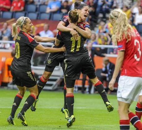 Stockholm 2013 07 28 Football UEFA Championship Womans final Norway vs Germany - Picture shows Anja Mittag GER 11 scores the only goal of the match - with Celia Okoyino Da Mbabi GER 13 and Marit Christiansen NOR 3 - KPkod 08002 