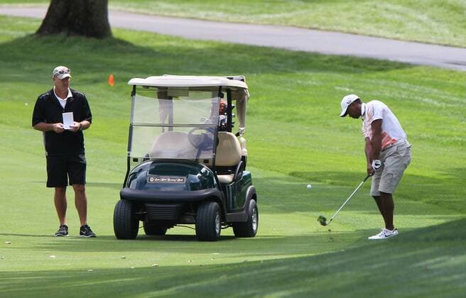 July 30, 2013 Tiger Woods with caddie Joe LaCava practices for the up coming PGA Golf Herren Championship Tournament at Oak HIll Country Club in Pittsford, NY. GOLF: JUL 30 PGA Golf Herren - PGA Golf Herren Championship - Practice Icon20135712 EDITORIAL USE ONLY