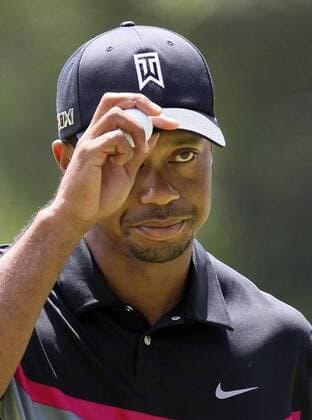 Aug. 1, 2013 - Akron, Ohio, U.S. - TIGER WOODS tips his hat to the gallery after making par on the 9th hole during the opening round of the WGC-Bridgestone Invitational at Firestone Country Club. Woods opened the 2013 WGC-Bridgestone Invitational with a 4-under round of 66 and is currently tied for third. Golf 2013 - Bridgestone Invitational - First Round - ZUMAm67