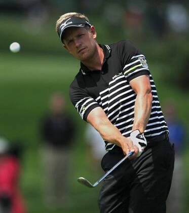 Aug. 1, 2013 - Akron, OH, USA - Luke Donald hits a chip shot on the 2nd hole during the opening round of the WGC-Bridgestone Invitational at Firestone Country Club in Akron, Ohio, on Thursday, August 1, 2013. WGC-Bridgestone Invitational - ZUMAm67