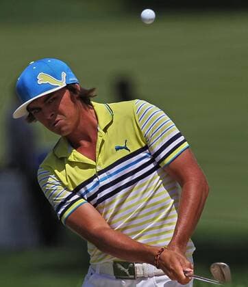 Aug. 1, 2013 - Akron, OH, USA - Ricky Fowler hits a chip shot onto the 2nd green during the opening round of the WGC-Bridgestone Invitational at Firestone Country Club in Akron, Ohio, on Thursday, August 1, 2013. WGC-Bridgestone Invitational - ZUMAm67
