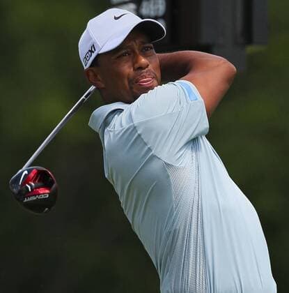 Aug. 3, 2013 - Akron, OH, USA - Tiger Woods hits his tee shot on the 6th hole during the third round of the WGC-Bridgestone Invitational at Firestone Country Club in Akron, Ohio, on Saturday, August 3, 2013. Woods carries a seven-shot lead heading into the final round. WGC-Bridgestone Invitational - ZUMAm67
