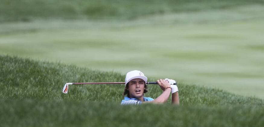 Aug. 3, 2013 - Akron, OH, USA - Ricky Fowler peeks out of a bunker on the 2nd fairway during the third round of the WGC-Bridgestone Invitational at Firestone Country Club in Akron, Ohio, on Saturday, August 3, 2013. WGC-Bridgestone Invitational - ZUMAm67