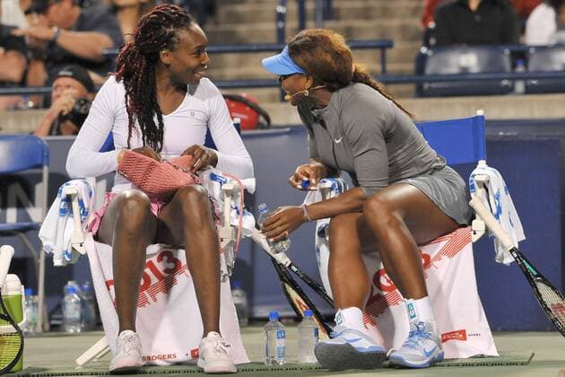 Aug. 5, 2013 - Toronto, Ontario, Canada - Toronto, Ontario, Canada, August 5, 2013. Serena Williams and Venus between games during a doubles exhibition match during the WTA Tennis Damen Rogers Cup at Rexall Centre in Toronto, Ontario, Canada on August 5th. .GerryxAngus CSM Tennis 2013: WTA Tennis Damen Rogers Cup AUG 5 - ZUMAc04