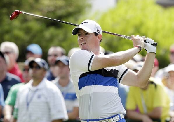 Rory McIlroy hits his tee shot on the the 10th hole in the first round of the PGA Golf Herren Championship at Oak Hill Country Club in Rochester, New York on August 8, 2013.  NYP20130808153