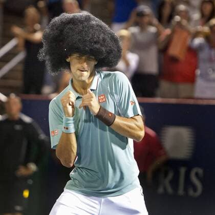 August 8, 2013 - Montreal, Quebec, Canada - NOVAK DJOKOVIC (SRB) wins his evening match during day 4 action and celebrates with a large afro wig and some dancing on centre court. Tennis 2013 - Rogers Cup Montreal - Day 4  - ZUMA