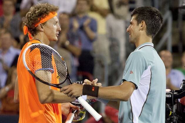 Aug. 08, 2013 - Montreal, Quebec, CAN - Novak Djokovic defeats Denis Istomin(L) during their evening match during day 4 action. Tennis 2013 - Rogers Cup - AUG 08 - ZUMAs30