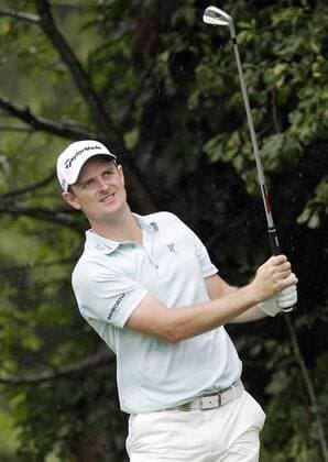 Justin Rose hits his tee shot on the 15th hole in the second round of the PGA Golf Herren Championship at Oak Hill Country Club in Rochester, New York on August 9, 2013.  NYP20130809113