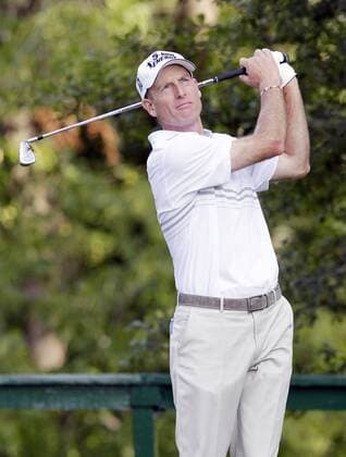 Jim Furyk hits his tee shot on the 15th hole in the second round of the PGA Golf Herren Championship at Oak Hill Country Club in Rochester, New York on August 9, 2013.  NYP20130809155