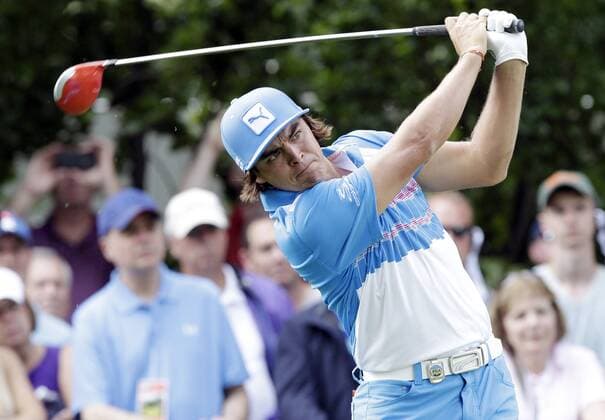 Rickie Fowler hits his tee shot on the 9th hole in the second round of the PGA Golf Herren Championship at Oak Hill Country Club in Rochester, New York on August 9, 2013.  NYP20130809162