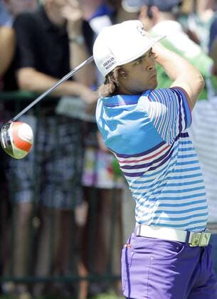 Rickie Fowler hits a tee shot on the 14th hole in the third round of the PGA Golf Herren Championship at Oak Hill Country Club in Rochester, New York on August 10, 2013.  NYP20130810101