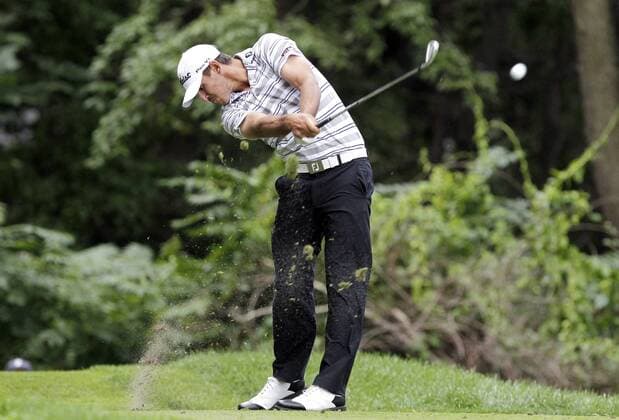 Brooks Koepka hits a tee shot on the 3rd hole in the final round of the PGA Golf Herren Championship at Oak Hill Country Club in Rochester, New York on August 11, 2013.  NYP20130811107