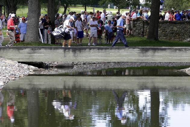 Jim Furyk walks to the 1st hole green in the final round of the PGA Golf Herren Championship at Oak Hill Country Club in Rochester, New York on August 11, 2013.  NYP20130811112
