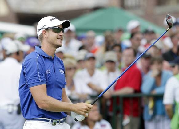 Henrik Stenson his tee shot on the 1st hole in the final round of the PGA Golf Herren Championship at Oak Hill Country Club in Rochester, New York on August 11, 2013.  NYP20130811117