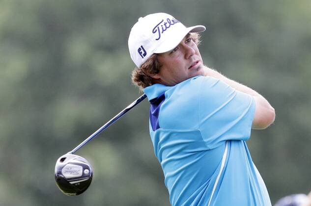 Jason Dufner hits his tee shot on the 2nd hole in the final round of the PGA Golf Herren Championship at Oak Hill Country Club in Rochester, New York on August 11, 2013.  NYP20130811124