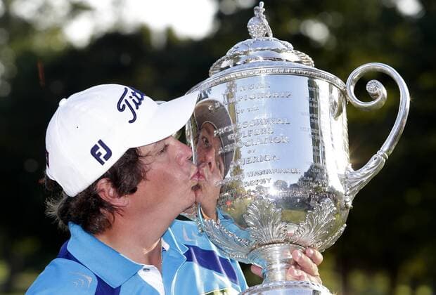 Jason Dufner kisses the Wanamaker Trophy after the final round of the PGA Golf Herren Championship at Oak Hill Country Club in Rochester, New York on August 11, 2013. Dufner won the 2013 PGA Golf Herren Championship with a score of 10 under par.  NYP20130811126
