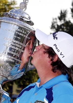 Jason Dufner kisses the Wanamaker Trophy after the final round of the PGA Golf Herren Championship at Oak Hill Country Club in Rochester, New York on August 11, 2013. Dufner won the 2013 PGA Golf Herren Championship with a score of 10 under par.  NYP20130811130