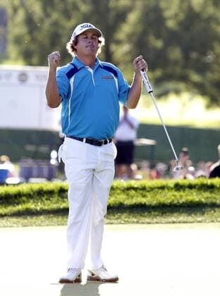 Jason Dufner reacts on the 18th green after the final round of the PGA Golf Herren Championship at Oak Hill Country Club in Rochester, New York on August 11, 2013. Dufner won the 2013 PGA Golf Herren Championship with a score of 10 under par.  NYP20130811131