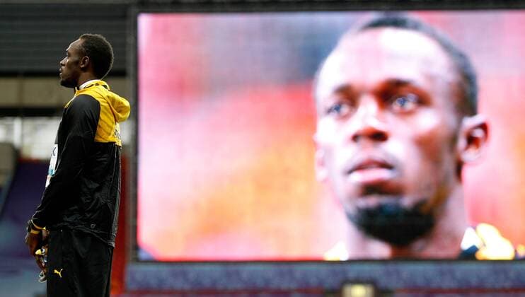 LEICHTATHLETIK - IAAF WM 2013 MOSKAU,RUSSLAND,12.AUG.13 - DIVERS, LEICHTATHLETIK - IAAF Weltmeisterschaften 2013, 100m der Herren, Siegerehrung. Bild zeigt Usain Bolt (JAM). 