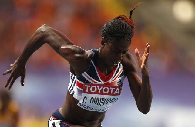 Großbritannien, Black History Month im Oktober - Sport Christine Ohuruogu of Great Britain competes during the Women s 400M Final at the 14th IAAF World Athletics Championships Moscow 2013 at Luzhniki Stadium in Moscow, Russia on Aug. 12, 2013. Christine Ohuruogu claimed the title with 49.41 seconds.(Xinhua Wang Lili) (SP)RUSSIA-MOSCOW-ATHLETICS-IAAF WORLD CHAMPIONSHIPS 