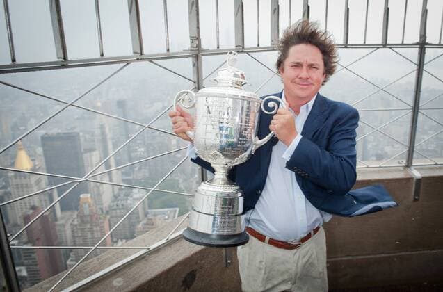 Aug. 13, 2013 - Manhattan, New York, U.S. - JASON DUFNER, 2013 PGA Golf Herren Championship winner, posing with the Wanamaker Trophy, visits the Empire State Building s 86th floor observatory to celebrate his win, Tuesday, August 13, 2013. 2013 PGA Golf Herren Championship Winner Jason Dufner Visits The Empire State Building - ZUMAb09