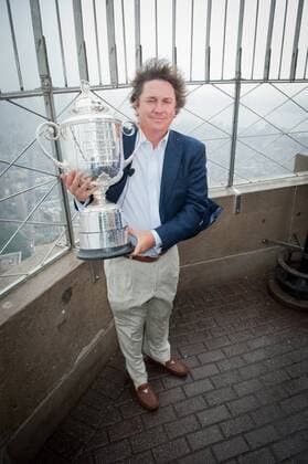 Aug. 13, 2013 - Manhattan, New York, U.S. - JASON DUFNER, 2013 PGA Golf Herren Championship winner, posing with the Wanamaker Trophy, visits the Empire State Building s 86th floor observatory to celebrate his win, Tuesday, August 13, 2013. 2013 PGA Golf Herren Championship Winner Jason Dufner Visits The Empire State Building - ZUMAb09